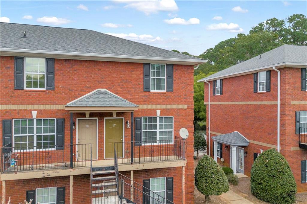 105 Whitehead Road, Unit 17 Athens, GA 30606 - Photo 3 of 38 a front view of a house with a yard