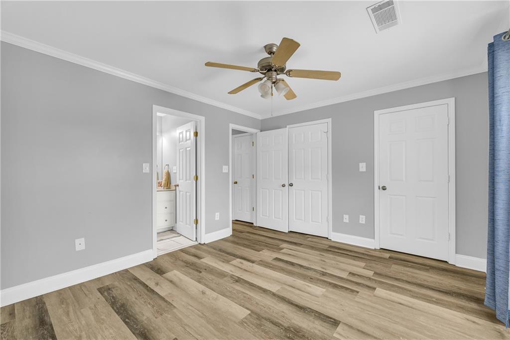 105 Whitehead Road, Unit 17 Athens, GA 30606 - Photo 31 of 38 a view of a livingroom with a ceiling fan & entryway