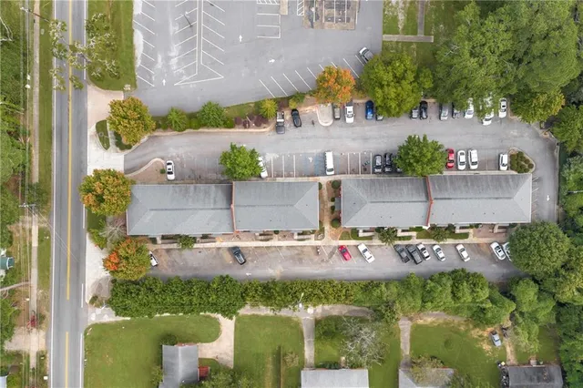 an aerial view of a house with a garden