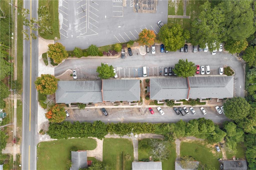 105 Whitehead Road, Unit 17 Athens, GA 30606 - Photo 36 of 38 an aerial view of a house with a yard basket ball court and outdoor seating