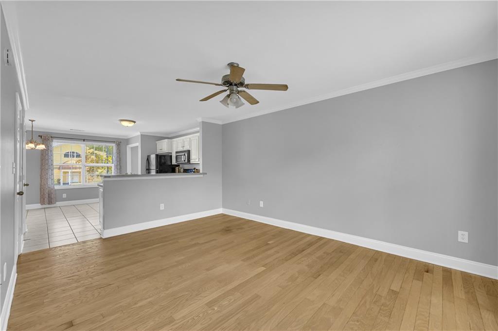 105 Whitehead Road, Unit 17 Athens, GA 30606 - Photo 6 of 38 a view of a kitchen with microwave and a sink