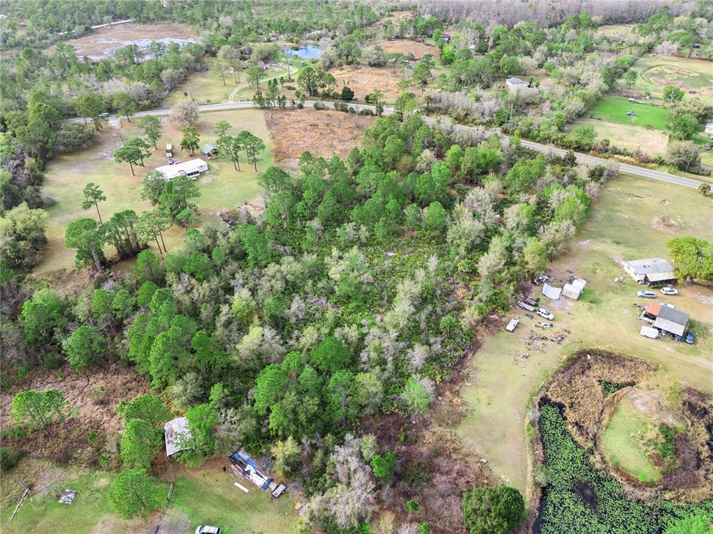 541 East Osceola Road Geneva, FL 32732 - Photo 9 of 31 an aerial view of residential houses with outdoor space