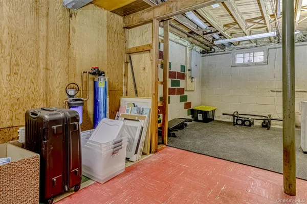 a view of a room with storage and utility room