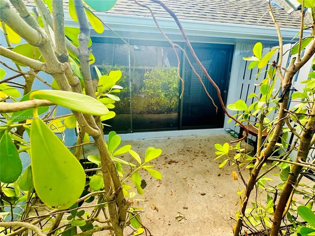 a view of a yard from a balcony