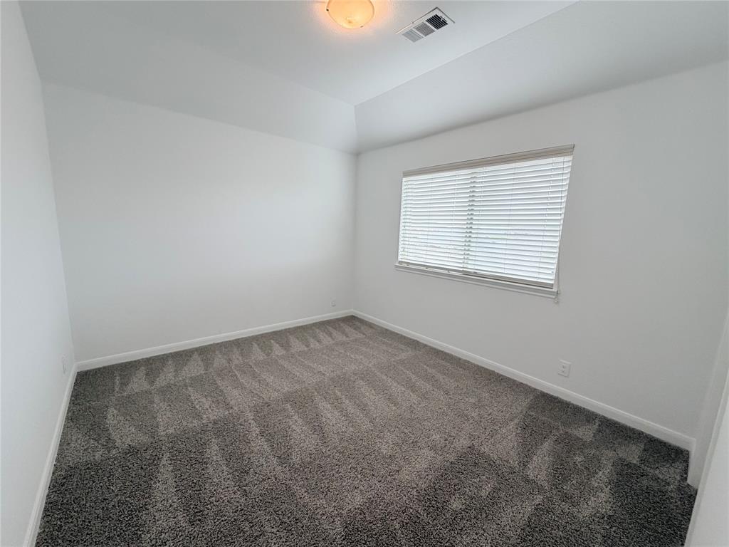 3310 Tanseyleaf Drive Forney, TX 75126 - Photo 13 of 33 an empty room with a window