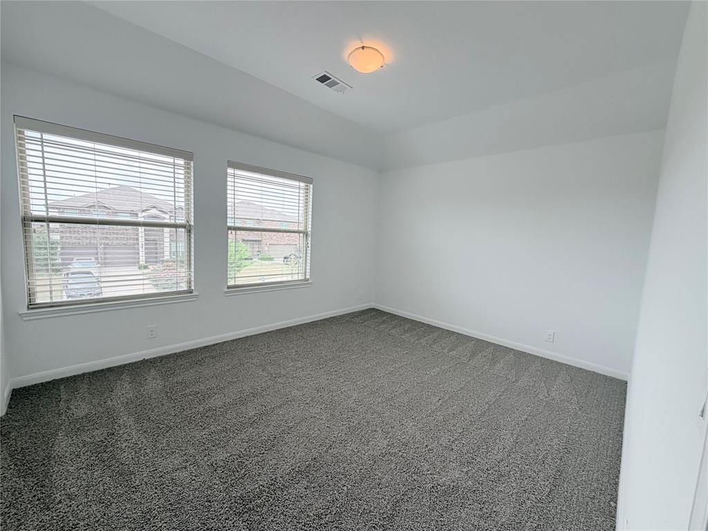 3310 Tanseyleaf Drive Forney, TX 75126 - Photo 18 of 33 an empty room with a window