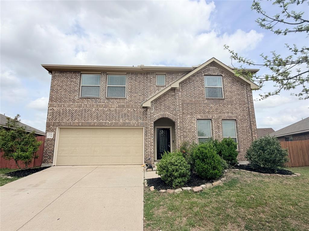 3310 Tanseyleaf Drive Forney, TX 75126 - Photo 2 of 33 a front view of a house with a garden