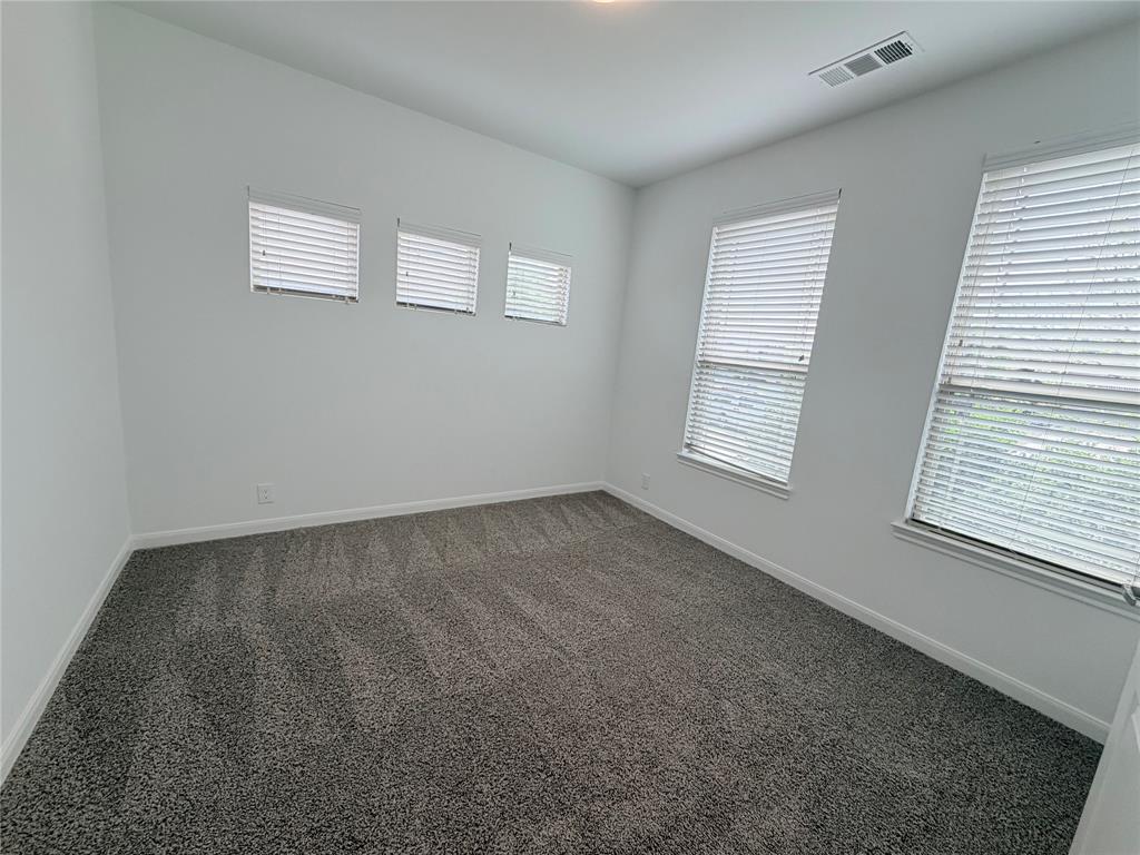 3310 Tanseyleaf Drive Forney, TX 75126 - Photo 29 of 33 a view of an empty room with a window