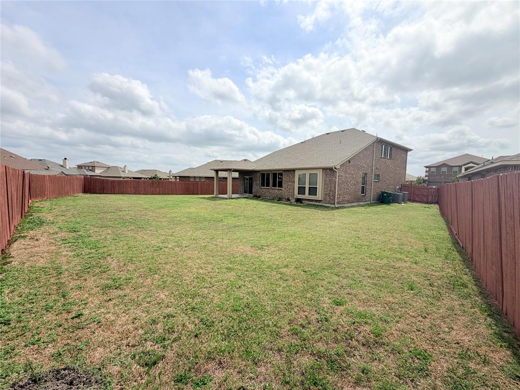 3310 Tanseyleaf Drive Forney, TX 75126 - Photo 33 of 33 a view of a house with a yard and sitting area