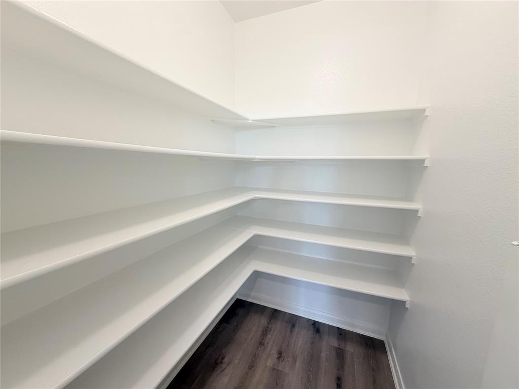 3310 Tanseyleaf Drive Forney, TX 75126 - Photo 10 of 33 a storage room with empty racks