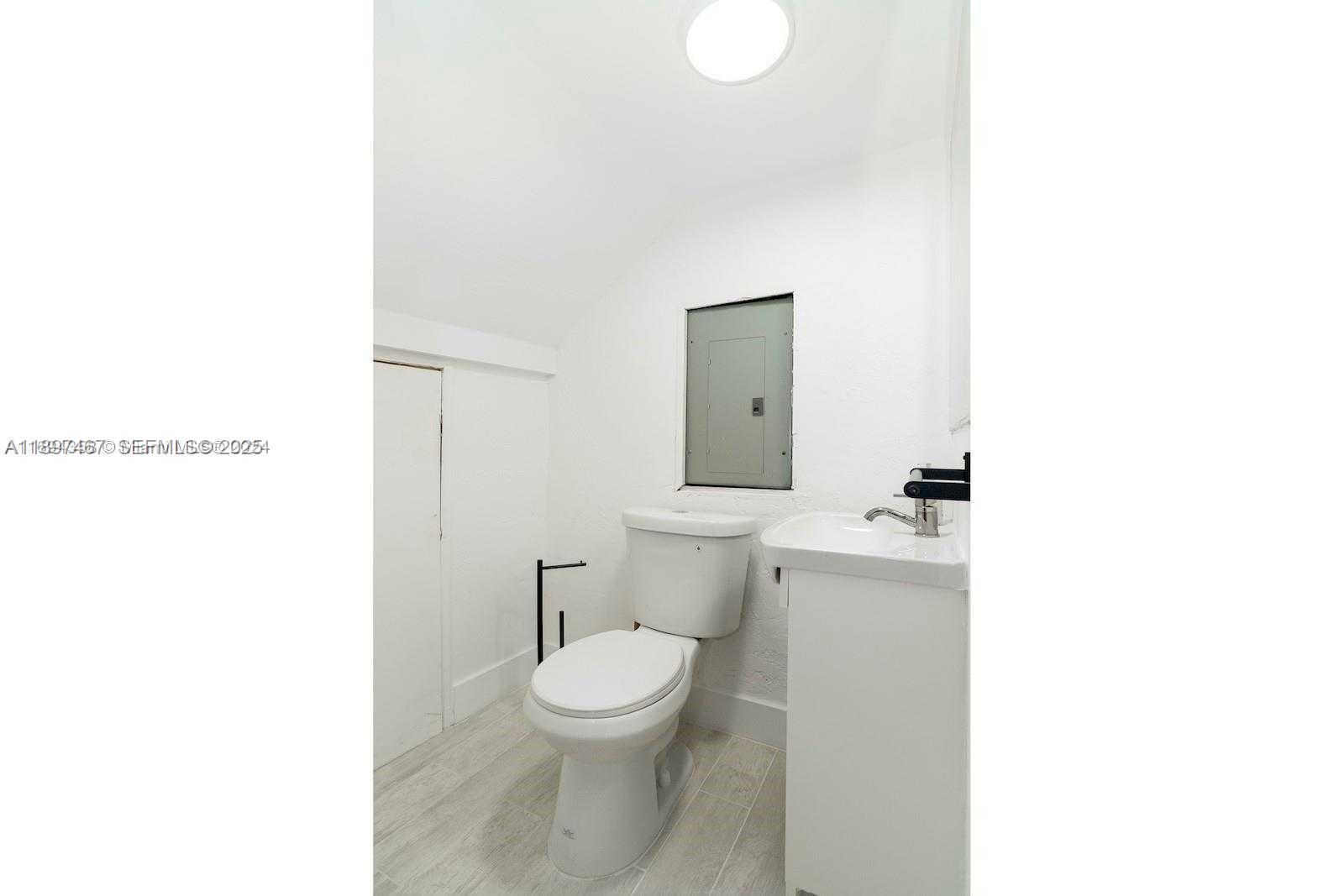 2729 Southwest 67th Avenue Miami, FL 33155 - Photo 30 of 39 a bathroom with a toilet