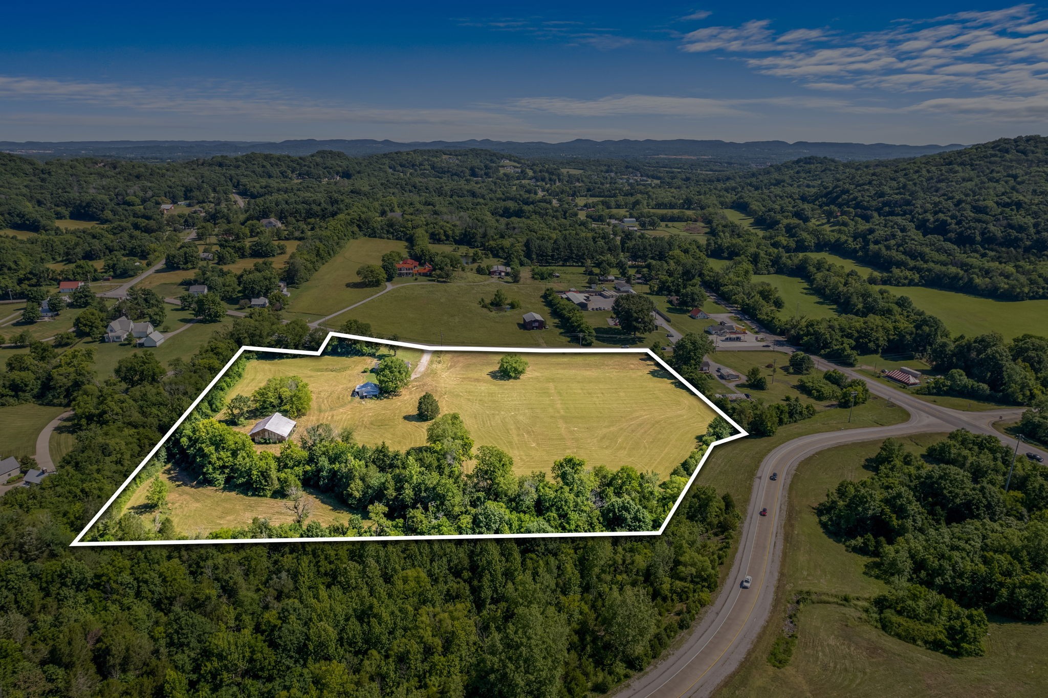 4767 Peytonsville Road Franklin, TN 37064 - Photo 4 of 35 an aerial view of houses with a swimming pool
