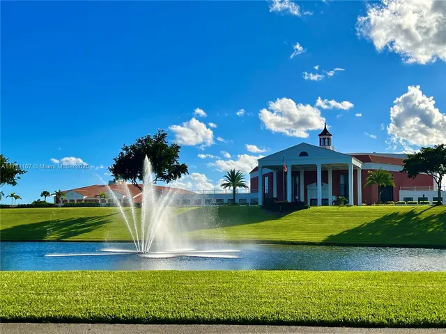 a view of a house with a big yard