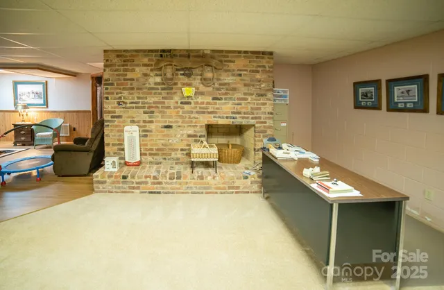 a view of a living room with furniture