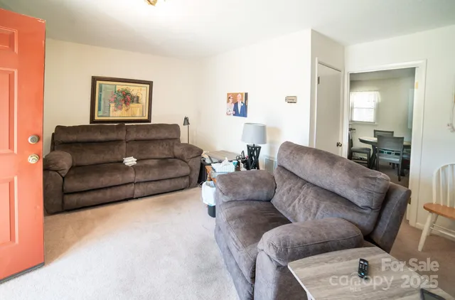 a living room with furniture and a couch