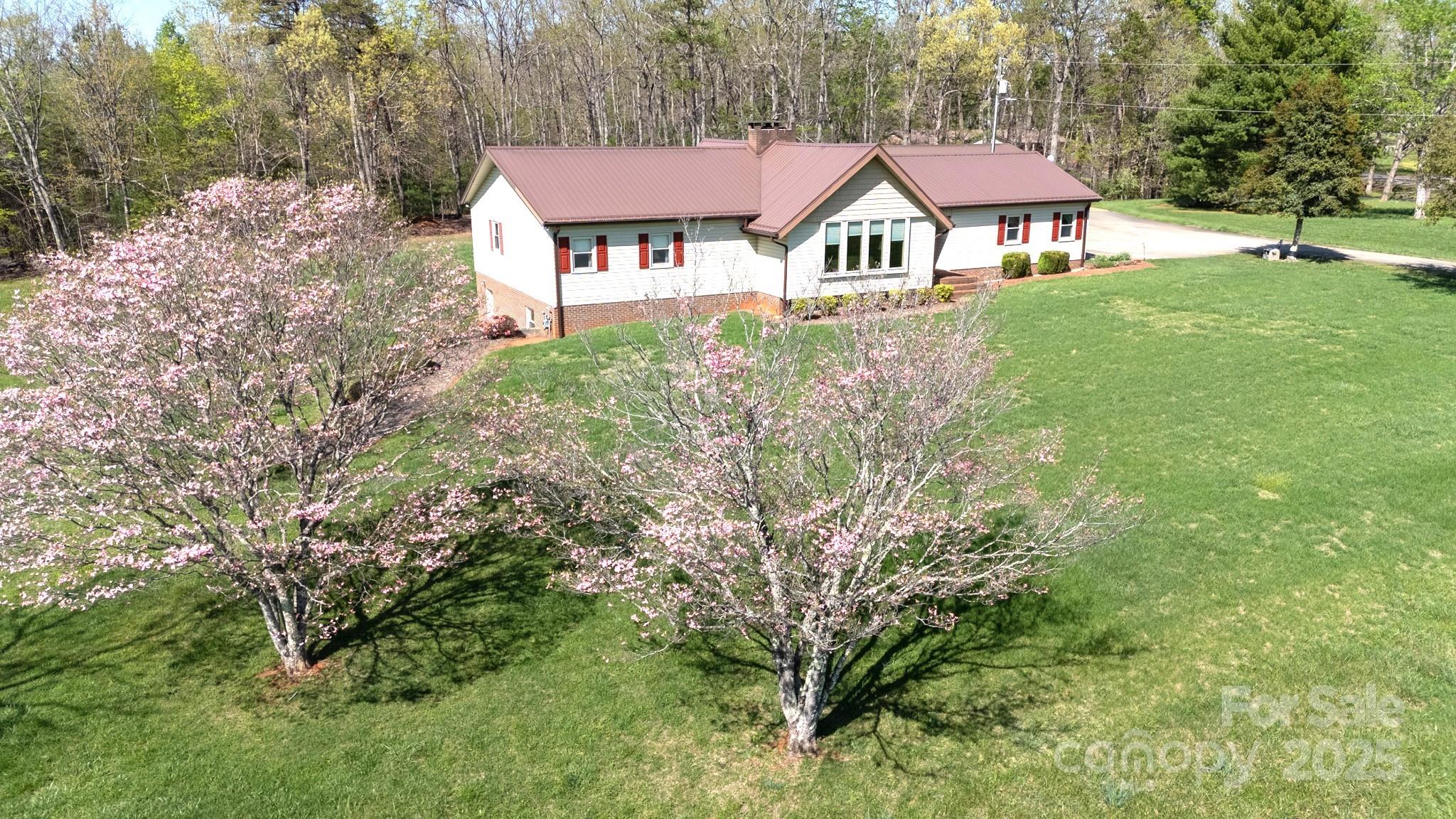 1368 Cajah Mountain Road Hudson, NC 28638 - Photo 4 of 36 a view of a yard in front of house