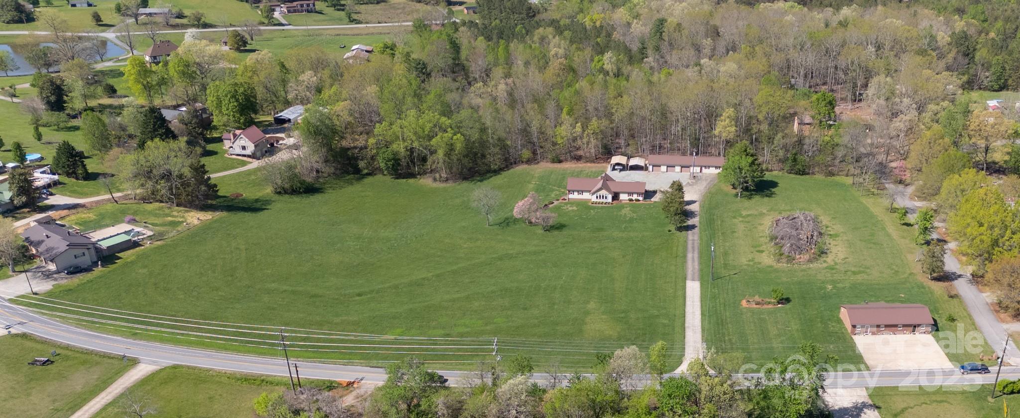 1368 Cajah Mountain Road Hudson, NC 28638 - Photo 6 of 36 an aerial view of a house having yard