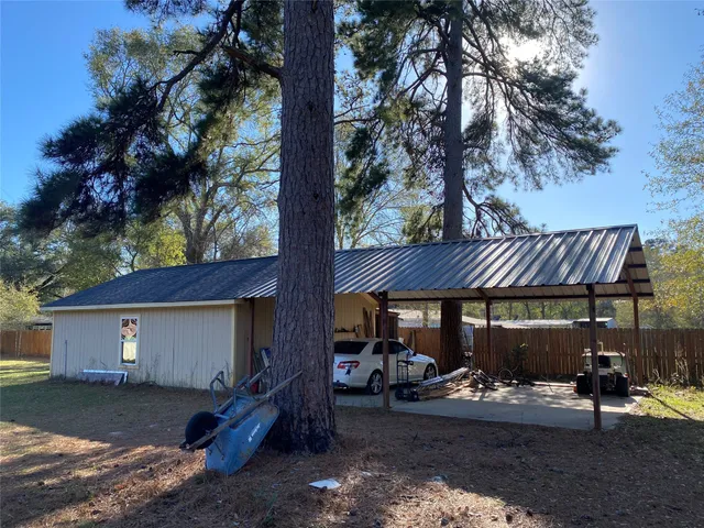 a view of a house with a big yard