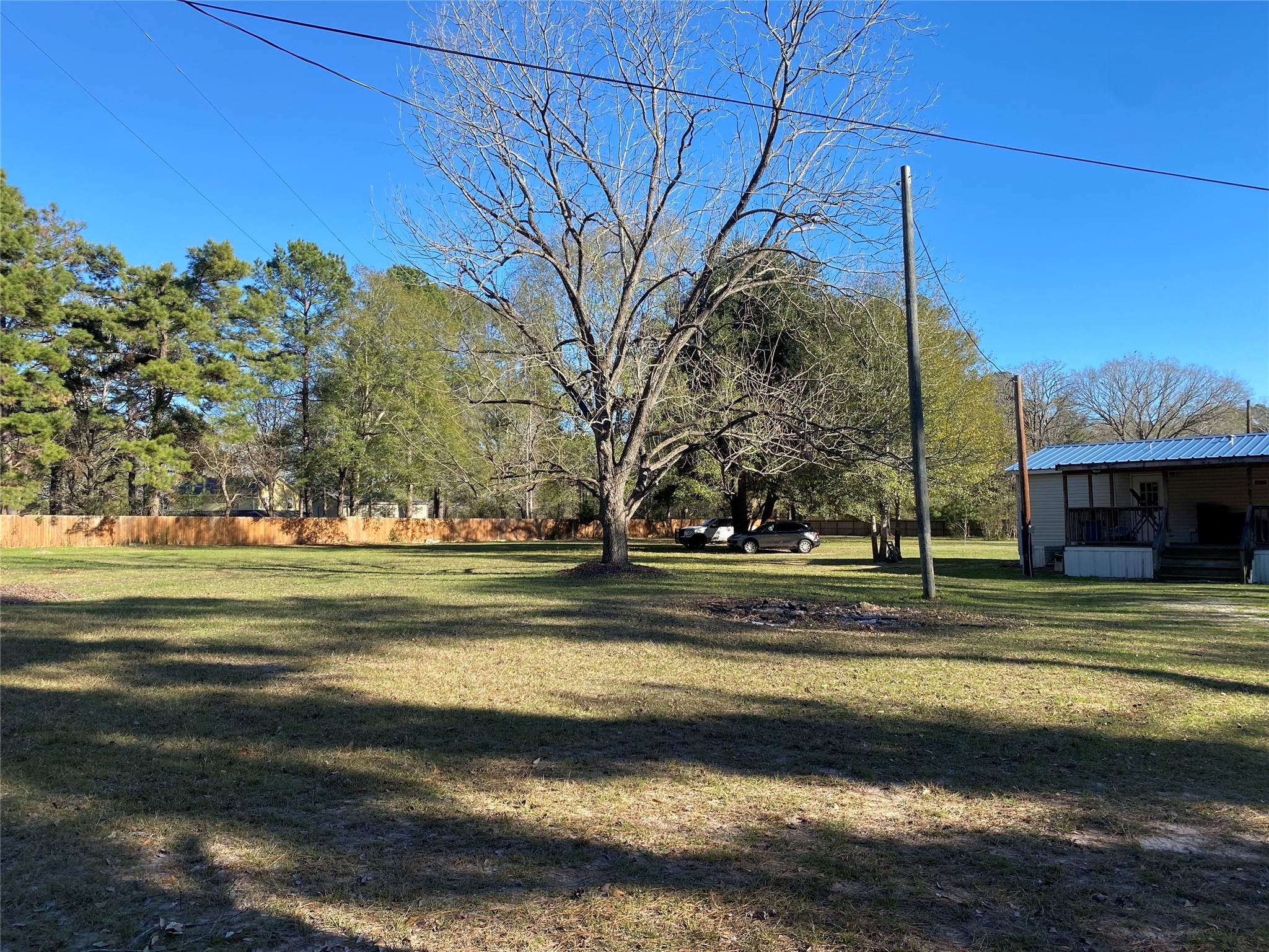 2581 Mann Road Conroe, TX 77303 - Photo 19 of 34 a view of a fountain in front of a house