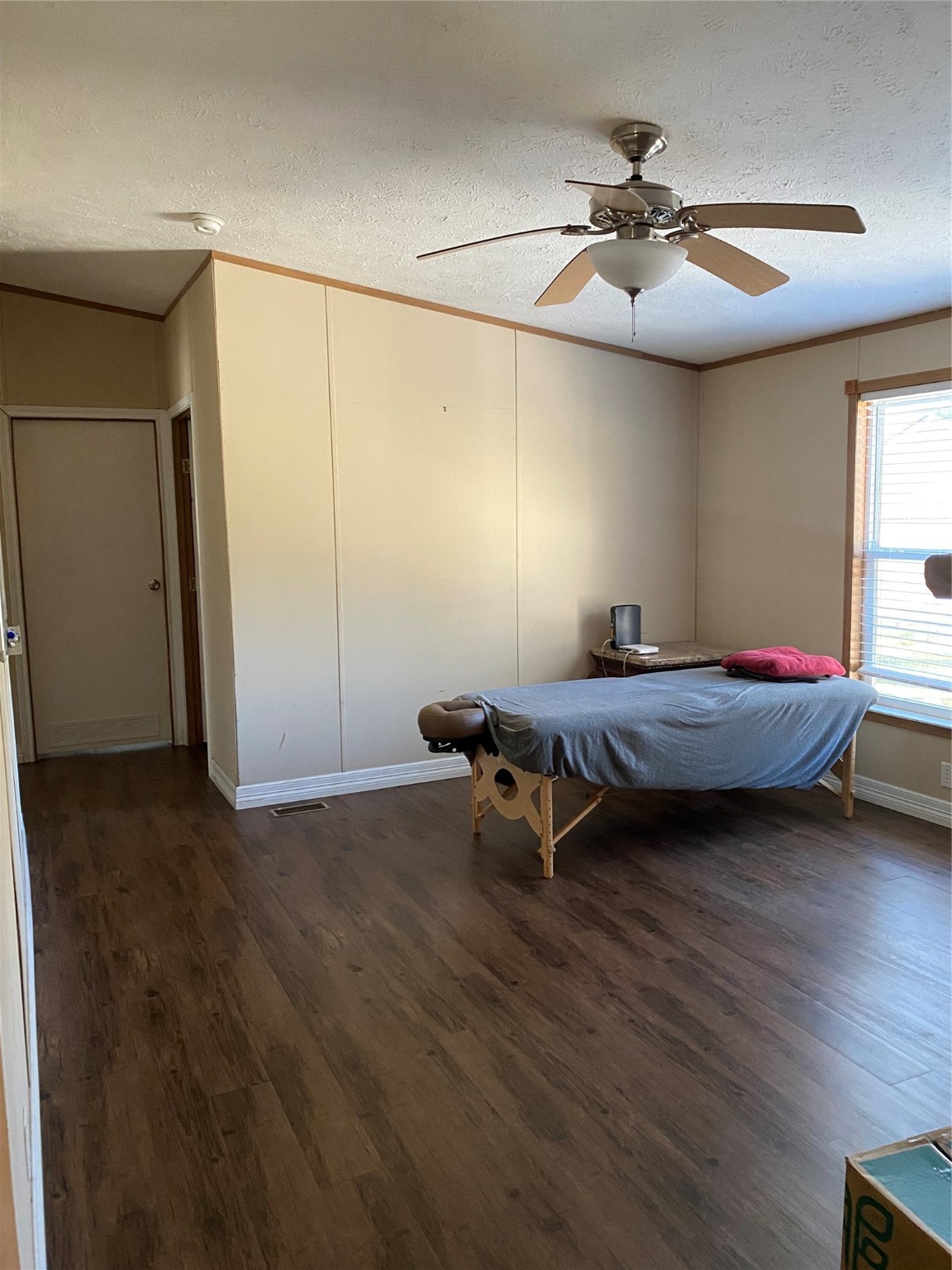 2581 Mann Road Conroe, TX 77303 - Photo 26 of 34 a living room with furniture and a ceiling fan