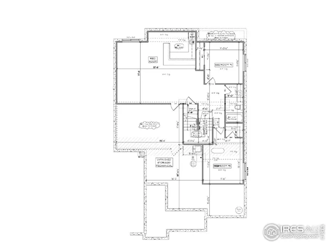 a picture of a bench in front of a wall