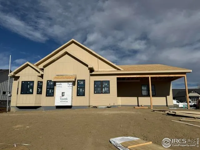 a view of a house with entrance gate