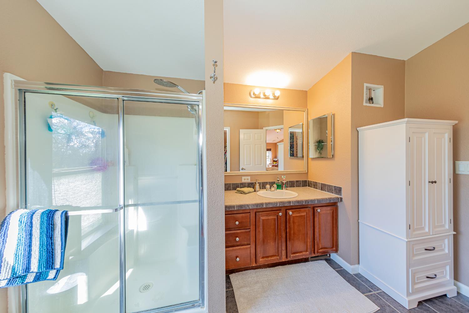 3335 Wildcat Road Mariposa, CA 95338 - Photo 34 of 48 a kitchen with a refrigerator a sink and a cabinets
