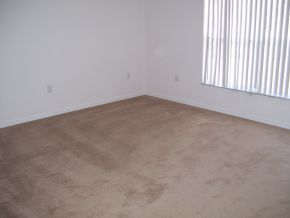 1029 Southwest San Rafael Palm Bay, FL 32908 - Photo 8 of 12 an empty room with a window