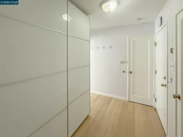 a kitchen with stainless steel appliances a refrigerator stove and microwave