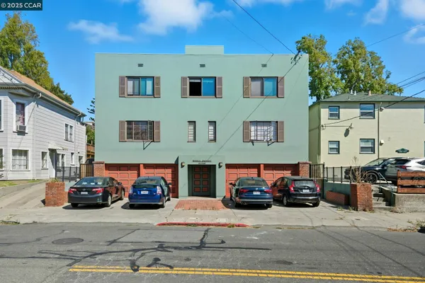 a cars parked in front of a building