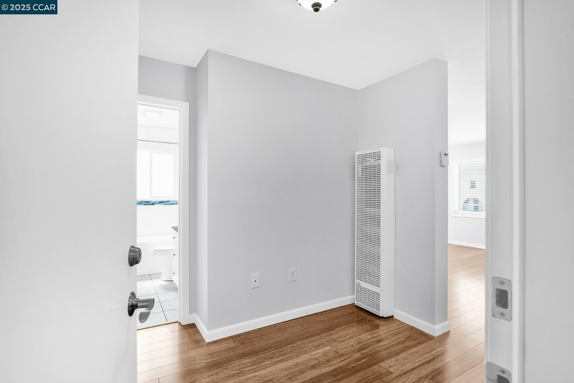 1919 Curtis Street Berkeley, CA 94702 - Photo 28 of 54 a view of entryway with wooden floor