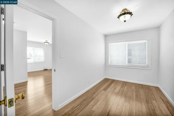 a view of room and wooden floor