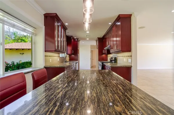 a view of kitchen and living room