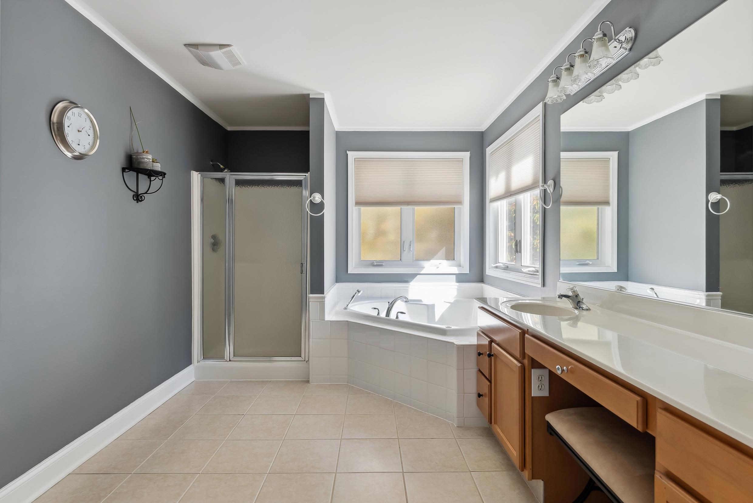 4 Mockingbird Woodbine, NJ 08270 - Photo 18 of 40 a spacious bathroom with a sink double vanity and a tub