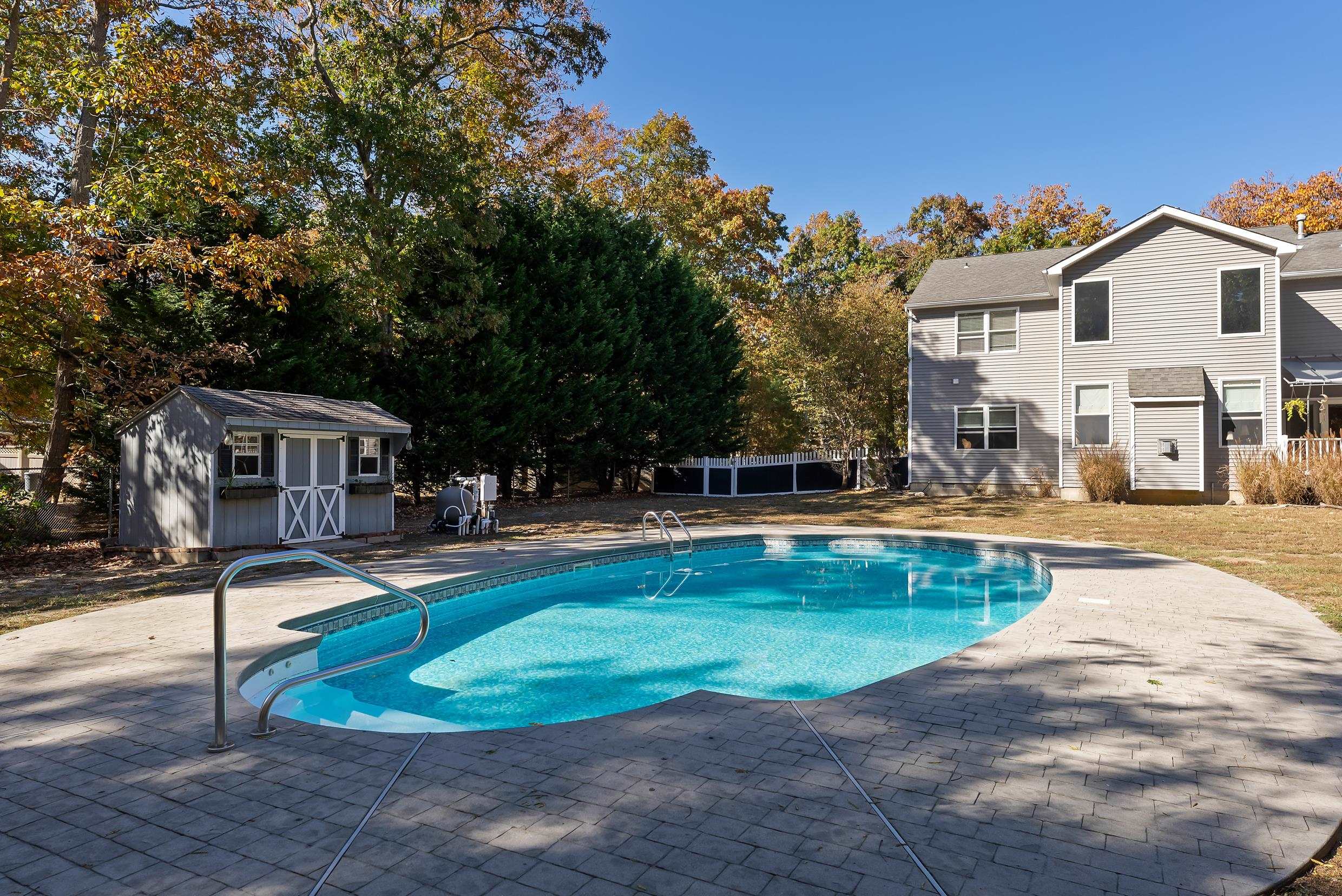 4 Mockingbird Woodbine, NJ 08270 - Photo 3 of 40 a view of a white house with a yard patio and swimming pool