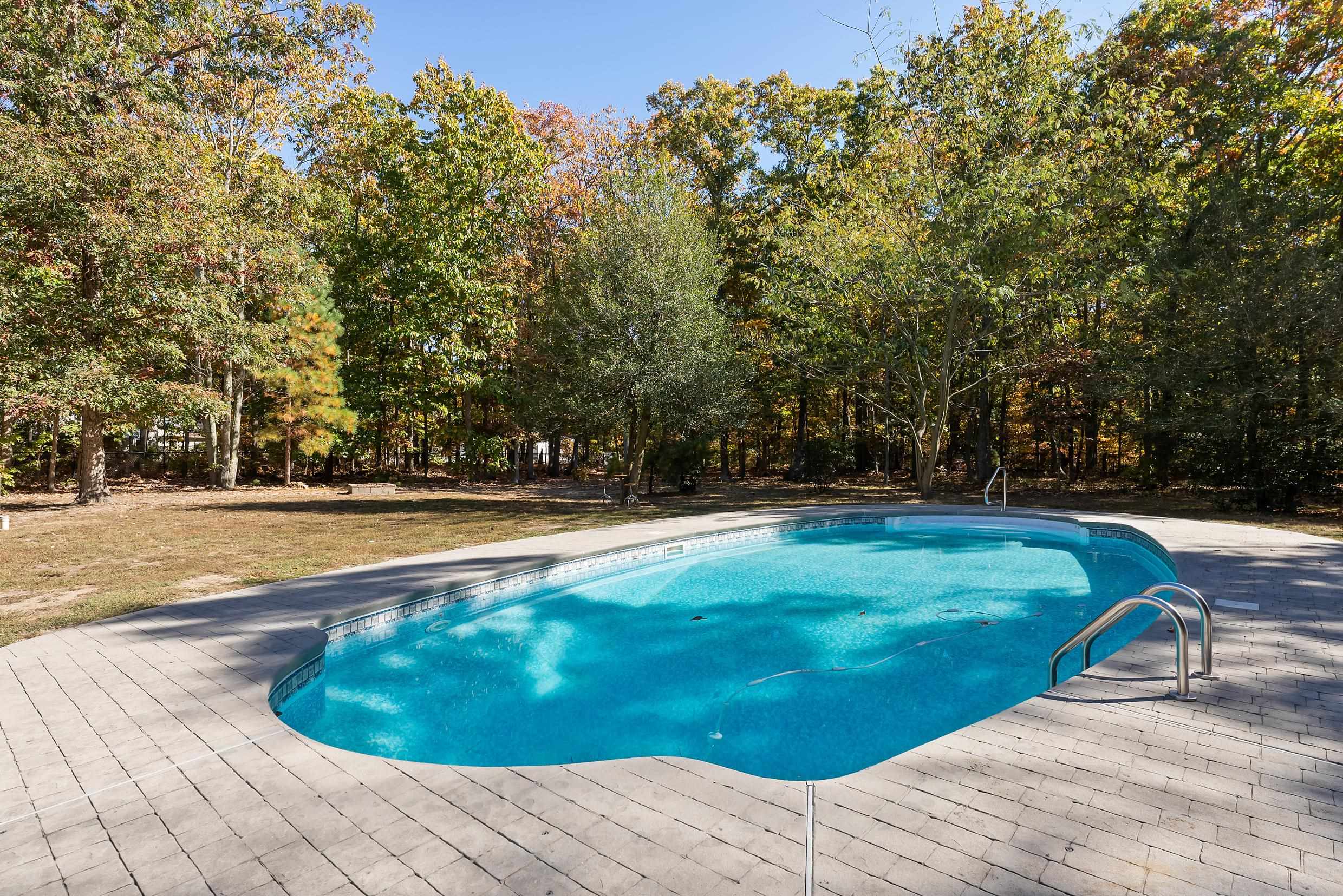 4 Mockingbird Woodbine, NJ 08270 - Photo 38 of 40 a view of a swimming pool with a yard