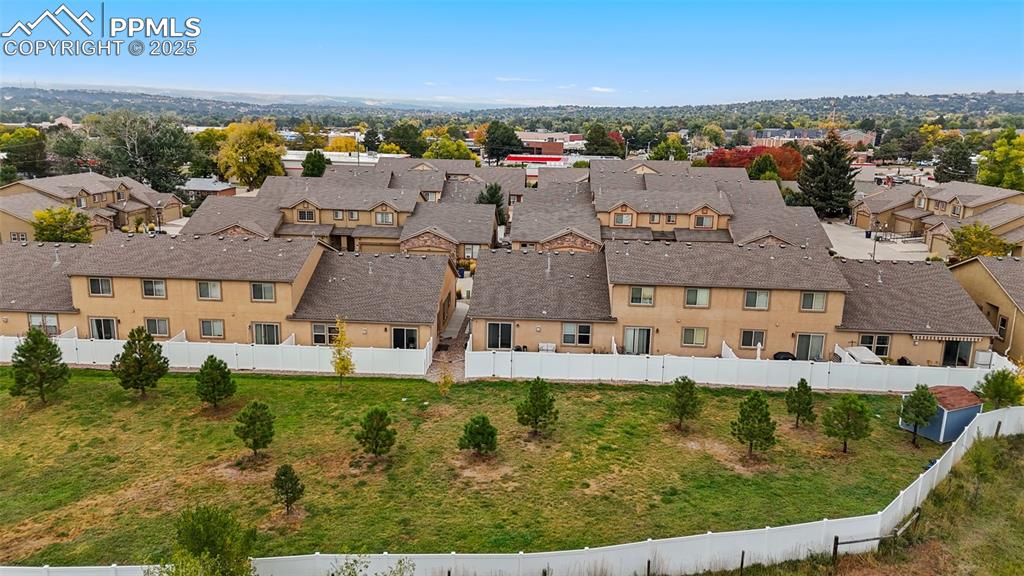 4139 Pk Hvn View Colorado Springs, CO 80917 - Photo 28 of 33 an aerial view of a house with garden space and lake view