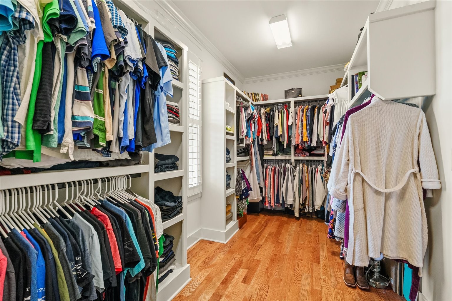 1032 Abbey Rd Way Spring Hill, TN 37174 - Photo 19 of 68 a view of walk in closet with clothes and shoes
