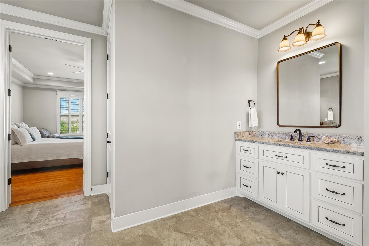 1032 Abbey Rd Way Spring Hill, TN 37174 - Photo 20 of 68 a spacious bathroom with a double vanity sink and a mirror