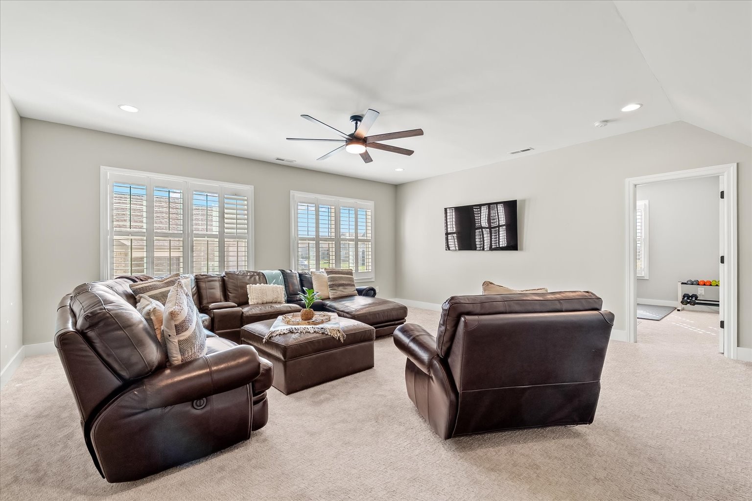 1032 Abbey Rd Way Spring Hill, TN 37174 - Photo 43 of 68 a living room with furniture a ceiling fan and a window
