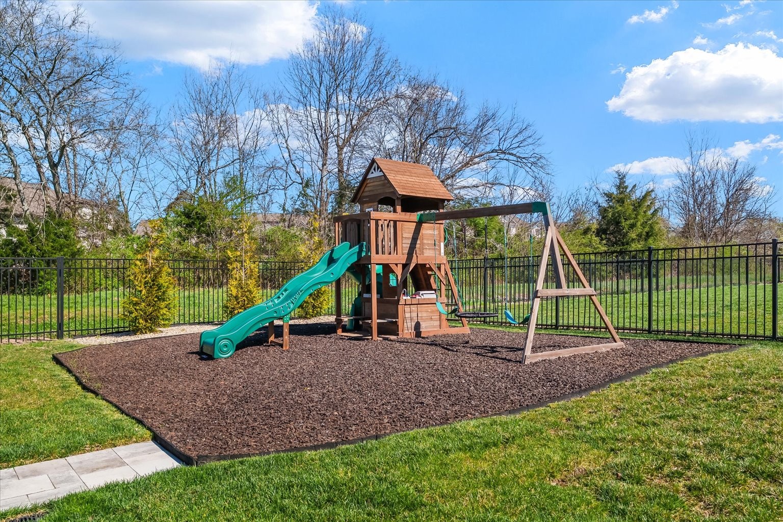 1032 Abbey Rd Way Spring Hill, TN 37174 - Photo 55 of 68 a view of a park with a slide