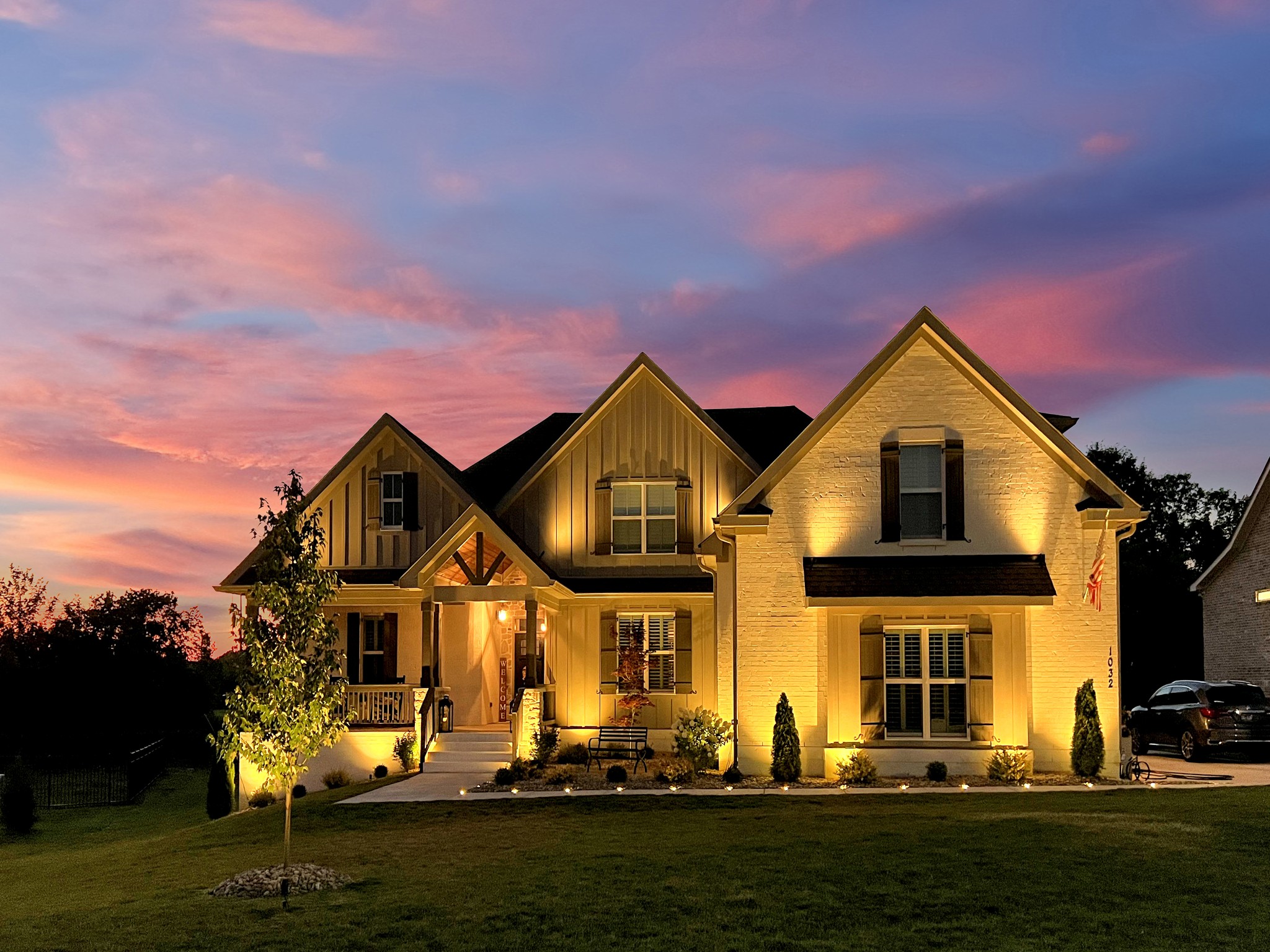 1032 Abbey Rd Way Spring Hill, TN 37174 - Photo 65 of 68 a front view of a house with a yard
