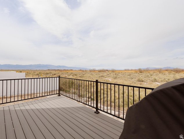 540 Lefty Lane Tooele, UT 84074 - Photo 29 of 48 Wooden terrace featuring grilling area and a mountain view