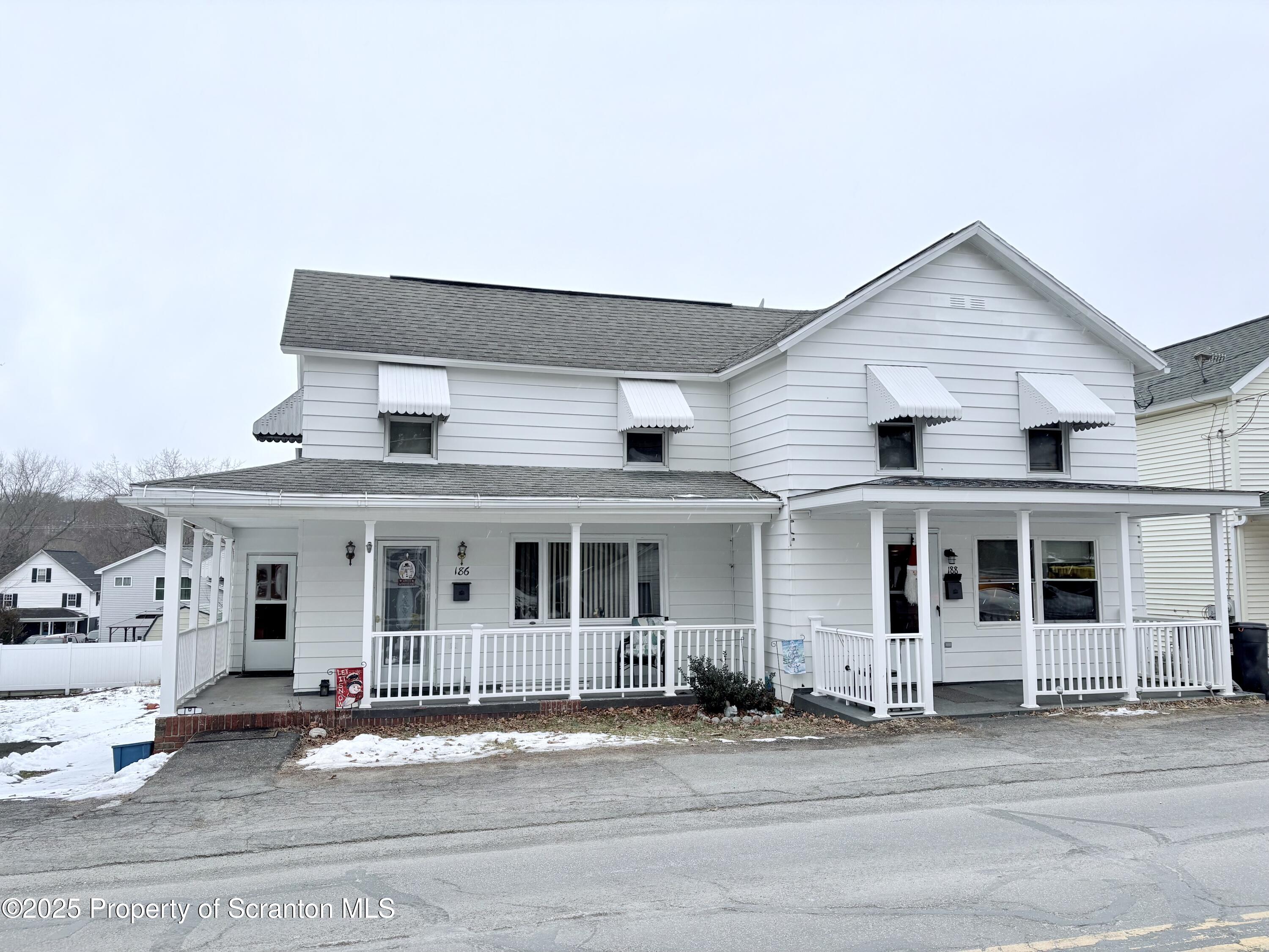 186 Cemetery Street Archbald, PA 18403 - Photo 1 of 28 front view of a house with a patio