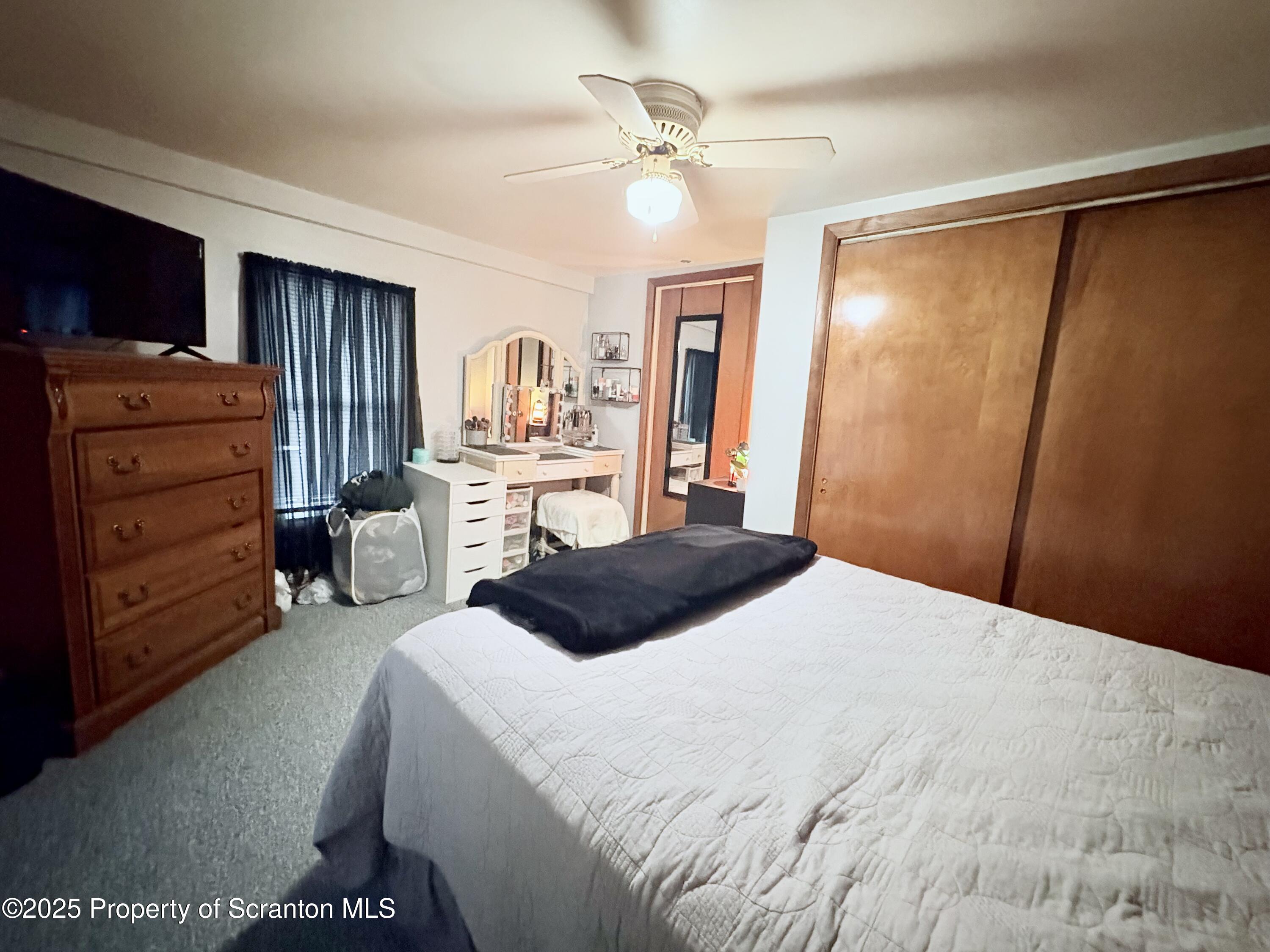 186 Cemetery Street Archbald, PA 18403 - Photo 19 of 28 a bedroom with a bed and a dresser