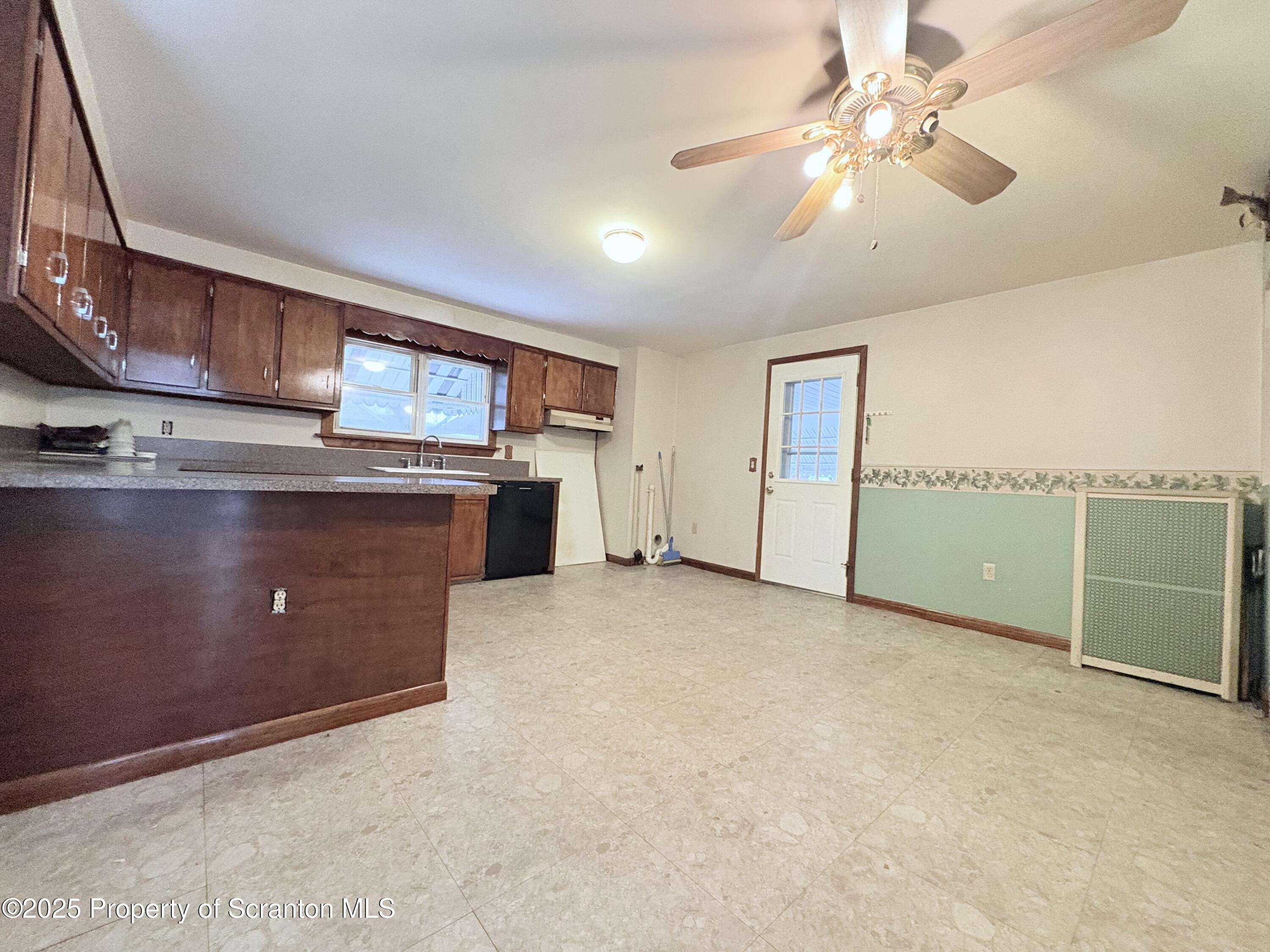 186 Cemetery Street Archbald, PA 18403 - Photo 20 of 28 a view of a kitchen with a sink cabinets and a kitchen
