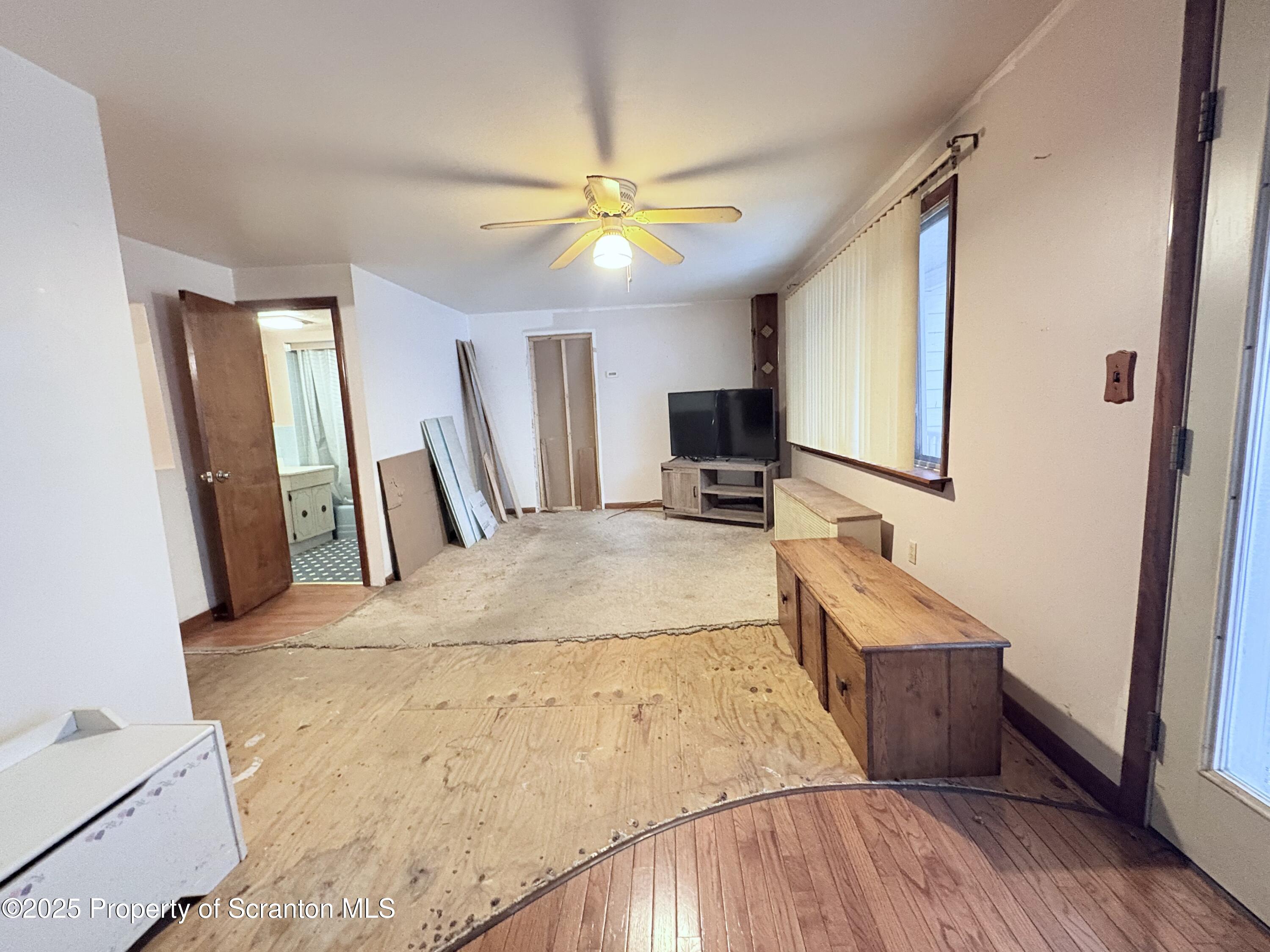 186 Cemetery Street Archbald, PA 18403 - Photo 23 of 28 a living room with furniture and a flat screen tv