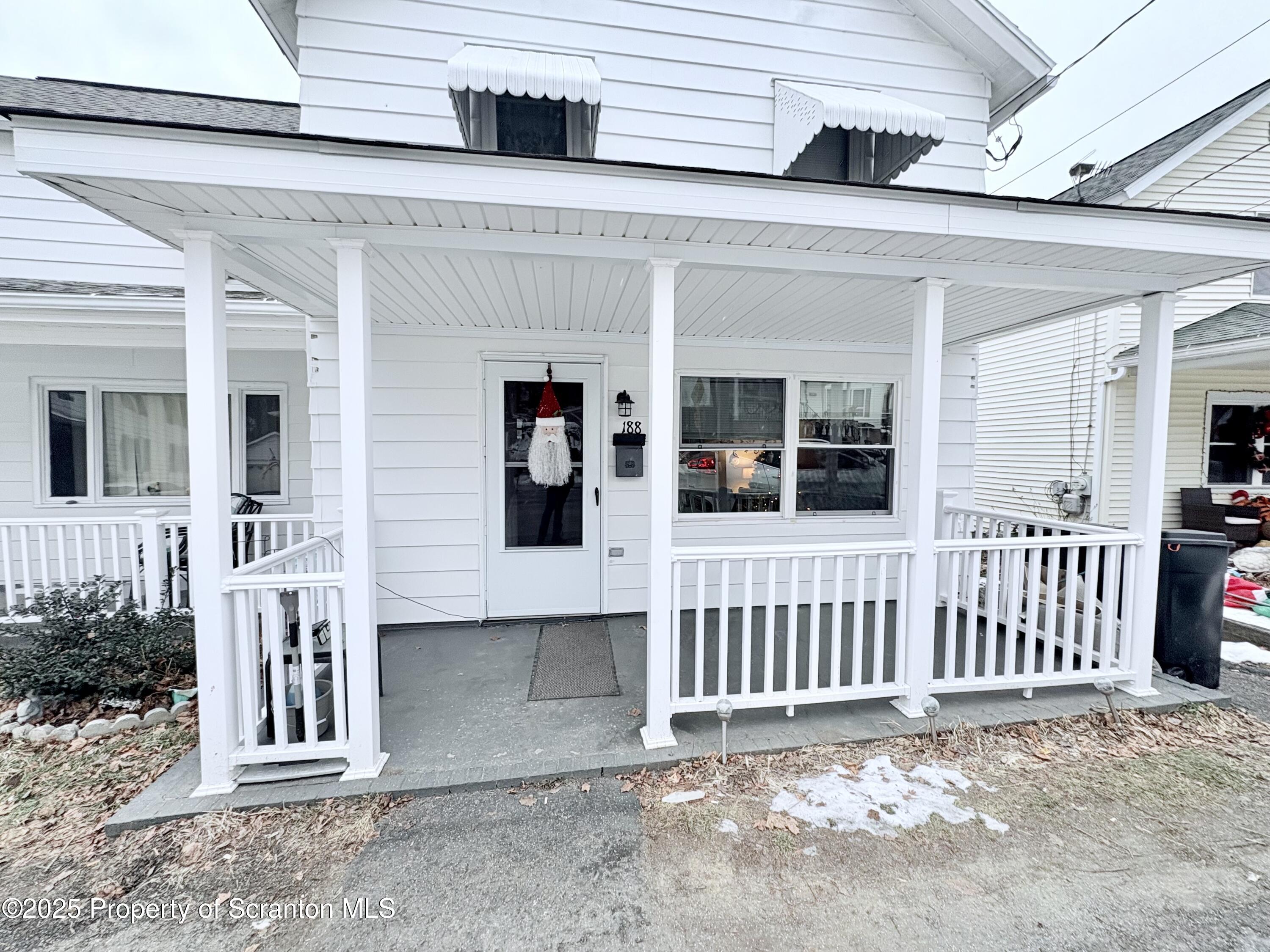 186 Cemetery Street Archbald, PA 18403 - Photo 4 of 28 front view of a house with a fence