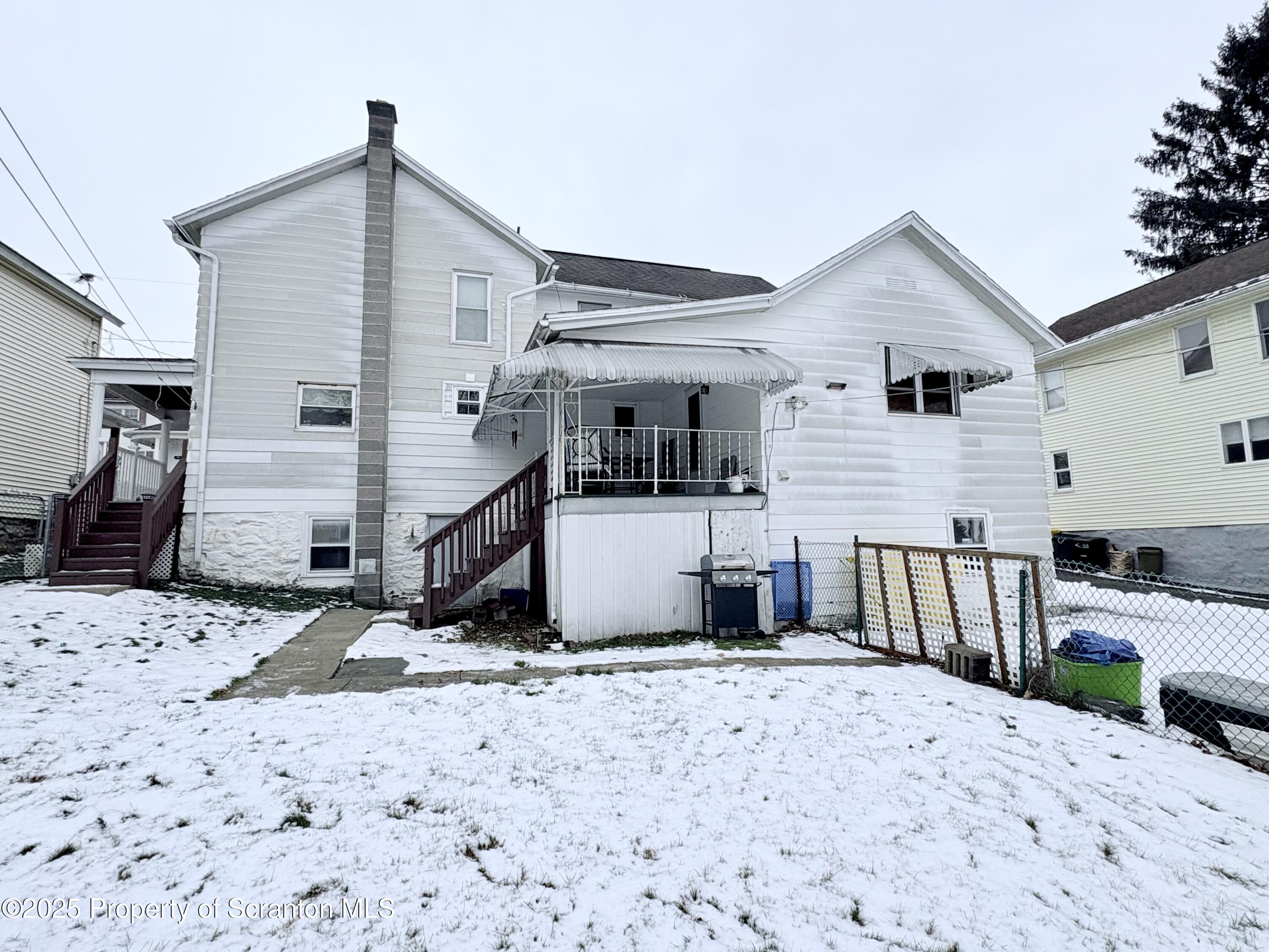 186 Cemetery Street Archbald, PA 18403 - Photo 5 of 28 a view of a house with a wooden deck