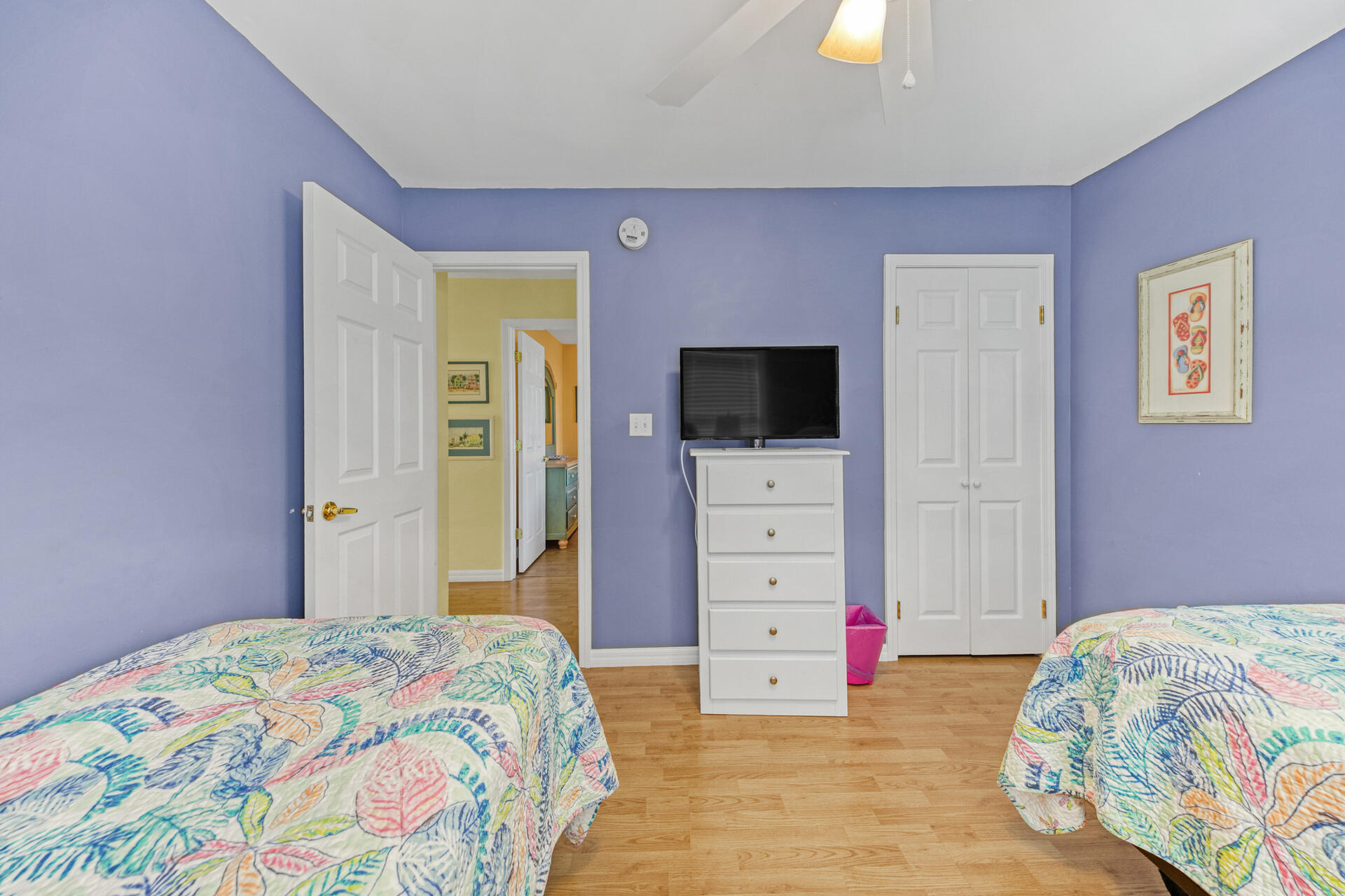 88 East Blue Crab Loop Panama City Beach, FL 32461 - Photo 19 of 55 a bedroom with a bed and a television